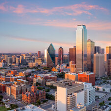 Dallas, Texas cityscape with blue sky at sunset, Texas