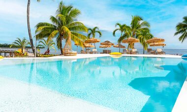 Spacifica Travel Cooks Bay Pool with beach view